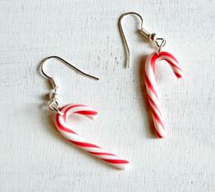 the candy cane earrings are red and white