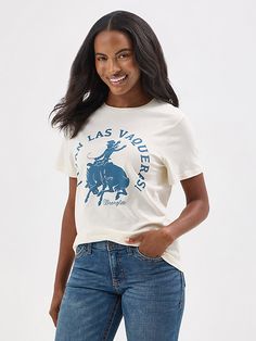 Add some spice to your look with the Women’s Vivan Las Vaqueras Tee. This classic crewneck is crafted from cotton for comfort and softness from season to season. It comes fully loaded with a retro-inspired graphic print of a bronc rider to celebrate the leading ladies of charreada. Bronc Rider, Men Workwear, Wrangler Women, Kimono Outerwear, Felt Cowboy Hats, Straw Cowboy Hat, Whisper White, Cap Fashion, Outerwear Sweater