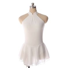 a white dress on a mannequin with a halter neck and ruffled skirt