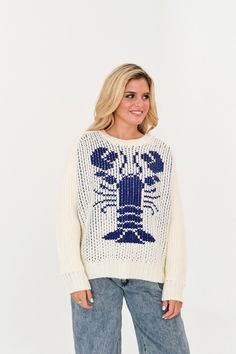 Stay cozy and stylish in our Evelyn Chunky Knit Lobster Sweater. This cream and blue sweater features a unique lobster design, making it a fun addition to your wardrobe. The chunky knit provides warmth and comfort, perfect for chilly days. Stand out from the crowd with this playful and practical sweater. Lobster Sweater, Lobster Design, Jean Romper, Thanksgiving Outfit, Blue Sweater, Stay Cozy, Blue Sweaters, Skirt Pants, Chunky Knit