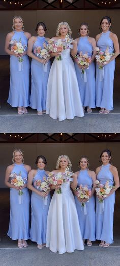 the bridesmaids are all dressed in blue dresses and holding their bouquets together