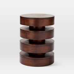 three tiered wooden side table with circular top