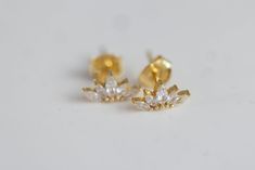 Bring a touch of elegance to any outfit with these Crystal Crown Studs. Crafted from gold vermeil and sparkling crystals, these studs provide a subtle yet sophisticated style. Crystal Crown, Stacked Jewelry, Sparkling Crystal, Jewelry Case, Simply Beautiful, Sophisticated Style, Free Jewelry, Gold Vermeil, 18k Gold