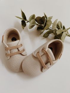 Comfortable Playtime Sneakers With Soft Sole, Comfortable Round Toe Booties For Playtime, Spring Playtime Booties With Rubber Sole, Cute Cream Non-slip Booties, Brown Sneakers With Soft Sole For Playtime, Spring Booties With Soft Sole For Playtime, Cream Booties With Round Toe For Playtime, Casual Lace-up Booties For Playtime, Cream Round Toe Booties For Playtime