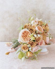 a bouquet of flowers sitting on top of a table