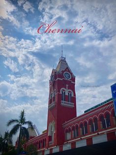 a large red building with a clock on it's side and the words chennai above it