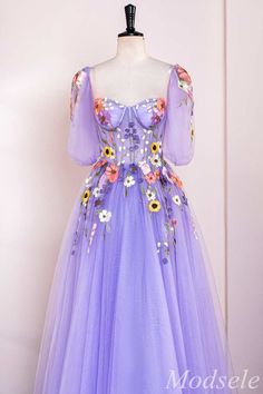 Make an elegant statement in this dreamy Lavender Floral Appliques Sweetheart A-Line Long Prom Dress. Delicate floral appliques add exquisite detail to the fitted corset bodice, while detachable puff sleeves add romantic flair. A-line silhouette creates effortless movement with every step. Let your beauty shine through for your special night.
Product Details


SKU: MD0737
Tulle Fabric
Full Length
Size: US 0-16. Check our Size Chart to get your correct size. 
Recommend custom size for plus size.
Free custom size service is available. Email your exact measurements once order is placed. 
Fully lined & Built with bra
Processing time: 10-15 business days. 
If you want to speed up your dress processing time, please put in the link of rush order fee into your shopping cart to check out with the i Lavender Tulle Dress, Accessories Wedding Guest, Detachable Puff Sleeves, Dress With 3d Flowers, Rapunzel Wedding, Fitted Corset, Fancy Stuff, Maternity Bridesmaid Dresses, Winter Formal Dresses