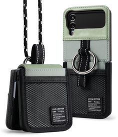 two cell phones are attached to a black and gray case with a ring on it