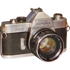 an old style camera with its lens up