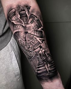 a man with a clock tattoo on his arm