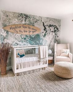 a baby's room with a surfboard on the wall