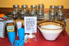 a table topped with lots of different types of food and condiments on top of it