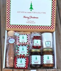 a box filled with jams on top of a wooden table next to a sign