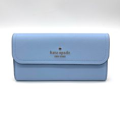 Brand New With Tag Kate Spade Rosie Large Flap Wallet Measurements 7.8" W X 4" H Color: Celeste Blue Features Metal Pinmount With Spade Logo Dust Bag Included: No Materials Pebbled Leather Lining: Two Way Spade Jacquard Lining Imported Classic Blue Travel Clutch, Classic Blue Clutch For Travel, Classic Blue Bags With Card Slots, Blue Designer Clutch With Removable Pouch, Chic Blue Rectangular Wallet, Kate Spade Blue Rectangular Wallet, Blue Clutch With Cell Phone Pocket, Kate Spade Clutch For Everyday Use, Chic Blue Bags With Card Slots