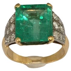 18K Edwardian 1900s Antique Natural Colombian Emerald Diamond Ring Size 7.5 Rectangular Cut Emerald, 10.8 mm by 11.7 mm by 6.6 mm deep, approximated to be 6.2 Carat, 5.20 Carat if you meassure as square 18 pieces single cut and transition cut Diamonds, clean and sparkly, appreximated to be 1/3 carat 18k marked 6.7 gr Antique Yellow Gold Emerald Ring With Diamond, Antique Emerald Ring With Diamond In Yellow Gold, Vintage Gia Certified Gold Emerald Ring, Antique Emerald Cut Yellow Gold Emerald Ring, Antique Emerald Ring In Yellow Gold For Formal Occasions, Antique Yellow Gold Emerald Ring For Formal Events, Antique Yellow Gold Emerald Ring For Formal Occasions, Art Deco Yellow Gold Emerald Ring With Brilliant Cut, Vintage Emerald Ring In Yellow Gold With Brilliant Cut