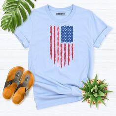 American flag shirt, 4th of July Shirt, USA flag shirt, Fourth Of July Shirt, Patriotic Shirt, Independence Day Shirt, USA Flag Distressed t-shirt Hello! Thank you for supporting small businesses. My main priority here is the satisfaction of my customers. My t-shirts are Bella+Canvas brand. If Bella+Canvas is out of stock, I will send it from a brand of the same size and quality. If you want to see this design on the SWEATSHIRT you can buy it from the link below.https://etsy.me/3LS0Viz T-shirts American Flag T-shirt For 4th Of July, Memorial Day Blue T-shirt With American Flag Print, Casual Blue T-shirt For Independence Day, Americana T-shirt With American Flag For 4th Of July, Casual Tops With American Flag For Veterans Day, Casual American Flag Tops For Veterans Day, Blue Patriotic T-shirt With American Flag Print, Patriotic Blue T-shirt With American Flag, Patriotic Tops With Flag Print For Veterans Day