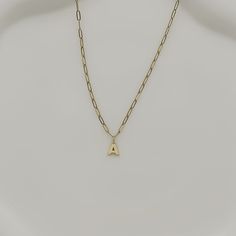 This custom 14k solid yellow gold initial necklace makes the perfect gift for that someone special or even yourself! Choose your initial and then choose your desired length. Each necklace is made to order by our in house specialists may take up to two weeks to ship. Gold Initial Necklace With Paperclip Chain For Everyday, Gold Minimalist Initial Necklace With Paperclip Chain, Minimalist Gold Initial Necklace With Paperclip Chain, Minimalist Yellow Gold Initial Pendant Necklace, Classic Yellow Gold Initial Necklace For Personalized Gift, Elegant Initial Pendant Necklace With Paperclip Chain, Yellow Gold Initial Pendant Name Necklace With Cable Chain, Everyday Initial Necklace With Paperclip Chain, Classic 14k Gold Initial Necklace