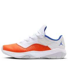 The Air Jordan 11 CMFT Low 'Knicks' is a stylish sneaker for adults, featuring a typical patent leather upper with a white base and vibrant orange wash. The muted roll-mesh fabric and clean white accents on the midsole, tongue structure and laces create a subtle yet eye-catching look. The interior tongue detailing and cushioning with mini Jumpman logo add to the sneaker's appeal. The 'Royal Blue' accents on the Cushlon sole unit provide a crisp finish. Perfect for everyday wear or sports activities, the Air Jordan 11 CMFT Low 'Knicks' is a must-have for any sneakerhead. (SNKR/AJ11/Retro/Low Top/Non-Slip/Basketball/Wear-resistant/Shock-absorbing) Orange Basketball Shoes With Rubber Sole, Orange Sporty Basketball Shoes With Rubber Sole, Orange Low-top Sneakers For Light Sports, White Low-top Custom Sneakers With Fade Resistance, Orange Sneakers With Boost Midsole For Light Sports, Orange Low-top Sneakers With Boost Midsole, Orange Synthetic Sneakers For Streetwear, Orange Jordan Shoes For Streetwear, Orange Leather Basketball Shoes For Streetwear