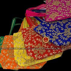 Design by Classical Dance Jewelry® ❥ Raw Silk with maggam work Potli bag for Favor Bag, Gift bag, Goody bag for Haldi kumkum Pongal, diwali, Parties, Events, Weddings, Housewarmings, Saree Ceremony, Dhoti Ceremony ❥ Dry clean only ❥ Material is raw silk ❥ Color: multi colors ❥ Design and color of the potli bag is subject to availability of the raw material. ❥ The potli bag is zip on top and back zip for phone. ❥ We will send item that are in stock close to the sample picture. ❥ Final Choice of s Bollywood Style Gold Bags For Navratri, Gold Bollywood Bag For Navratri, Traditional Gold Bag For Navratri, Traditional Gold Bags For Navratri, Traditional Gold Potli Bag For Navratri, Traditional Gold Potli Bag For Festivals, Diwali Gold Potli Bag With Pallu, Traditional Diwali Festive Potli Bag, Gold Potli Bag With Pallu For Festivals