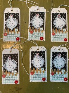 four tags that have been made to look like chickens