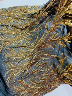 Leaf Design Sequins Fabric This incredible fabric showcases a stunning leaf pattern created with shiny... Tables Decorations, Gold Sequin Fabric, Gala Gown, Sequins Fabric, Night Gowns, Elegant Prom Dresses, Sequin Design, Faux Fur Fabric, Fur Fabrics