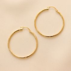 Gold KT: 14K Gold Gold Color: Yellow Gold Earring Closure: Latch Back Earring Thickness: 2mm Inner Diameter: 30mm Classic 14k Gold Filled Tarnish Resistant Hoop Earrings, Classic Tarnish Resistant 14k Gold Filled Hoop Earrings, Tarnish Resistant Yellow Gold Hoop Earrings, Classic Small Hoop 14k Gold Filled Earrings, Classic Round Hoop Earrings In 14k Gold Filled, Classic 14k Gold Filled Round Hoop Earrings, Classic Round 14k Gold Filled Hoop Earrings, Classic Gold Hoop Earrings With Ear Wire, Gift Bundles