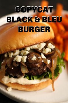 a close up of a burger on a plate with carrots in the background and text overlay that reads copycat black & blue burger