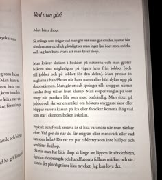 an open book with the title page in english and german on it's left side