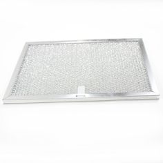 a metal tray with a white cross on the bottom and silver mesh around it, against a white background