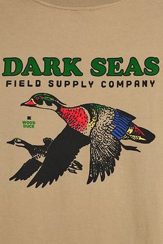 a t - shirt that says dark seas field supply company with a bird on it