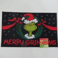 a christmas banner with the grin face on it