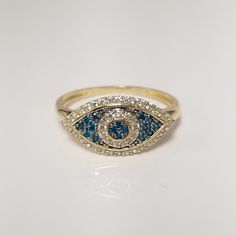 "Thanks for shopping our vintage estate store. We tend to sell well below wholesale and truly hope you enjoy all of our items. Many of the items are one of a kind, so please enjoy scrolling through the pictures and hopefully something will catch your eye. Spots are from reflections or camera. Beautiful estate 10k yellow white gold blue white ocean .20ct cz diamond evil eye ring. Just stunning. Size: 7 Setting: 9mm 39\" by 5/8\" Band width: 1.5mm Weight: 1.57 grams Love this ring, marked 10k." Diamond Evil Eye, Evil Eye Ring, Eye Ring, Pretty Earrings, Cz Diamond, Locket Necklace, Buying Jewelry, Evil Eye, Locket