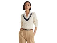 LAUREN Ralph Lauren Petite Cable-Knit Cricket Sweater - Women's Clothing : Mascarpone Cream/French Navy : Keep yourself warm and cozy on a chilly day wearing the LAUREN Ralph Lauren Petite Cable-Knit Cricket Sweater. Casual fit. Pullover style. Wide V-neckline. Full sleeves. Cable-knit construction. 100% cotton. Machine wash. Imported. Measurements: Length: 24 in Product measurements were taken using size PM. Please note that measurements may vary by size. Classic Luxury Polo Sweater With Button Cuffs, Luxury Fall Polo Sweater With Fold Down Collar, Luxury Textured Knit Polo Sweater For Fall, Luxury Polo Sweater With Button Cuffs For Fall, Luxury Classic Textured Knit Polo Sweater, Luxury Cashmere Polo Sweater For Work, Luxury Elegant Polo Sweater With Crew Neck, Luxury Cotton Polo Sweater For Winter, Luxury Cotton Polo Sweater For Spring