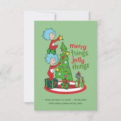 a christmas card with an image of the cat in the hat on top of a tree