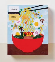 a book with an image of noodles in a red bowl