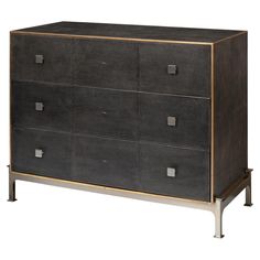 a black and gold dresser with four drawers