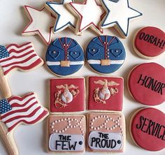 decorated cookies are arranged in the shape of american flags and stars with words on them