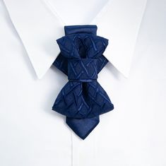 "The tie that changes your look Hopper tie is a new original product, presented by Ruty Design. This unisex accessory is a modern combination of elements found on traditional ties and bow ties. It is recommended not to tighten the regulation strip too much: Hopper tie is at its best when leveled up with the collar line. Freestyle fashion lovers should bear in mind that this accessory also looks great with the collar unbuttoned. With love, Rūta Piekurienė This unique product registered as „one of Dapper Blue Bow For Black Tie Events, Blue Standard Bow Tie For Black Tie Events, Blue Standard Bow Tie For Father's Day, Blue Bow Tie For Black Tie Events, Blue Bow Ties For Business, Blue Bow Tie For Business, Blue Bow Tie For Father's Day, Blue Bow Tie Back For Business, Dapper Blue Bow With Ties