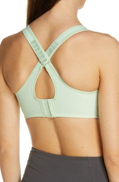 A soft and supportive sports bra is fashioned with wide shoulder straps and a powerful exterior underwire for an exceptionally secure and comfortable fit. Moisture-wicking fabric keeps skin cool and dry. Convertible straps can also be worn crossed in back. Lined. 80% nylon, 20% spandex. Hand wash, line dry. By Wacoal; imported. Lingerie. Functional Sports Bra With Built-in Bra And Wide Straps, Athleisure Sports Bra With Built-in Padding And Wide Straps, Supportive Nylon Sports Bra With Built-in Padding, Supportive Cross Back Sports Bra With Built-in Padding, Nylon Racerback Sports Bra With Built-in Bra, Athleisure Sports Bra With Built-in Padding, Nylon Bra With Light Support And Stretch, Nylon Stretch Bra With Light Support, Sports Bra With Adjustable Racerback Straps