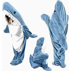 two people in shark costumes standing next to each other