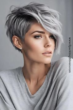 Image of a woman with gray hair and pixie cut with side swept bangs Asymmetrical Edgy Hair, Gray Hair Black Highlights, Grey Long Pixie Haircut, Short Haircuts Edgy, Pixie Haircut With Long Bangs Edgy, Short Hair Long Bangs Pixies, Long Pixie Haircut 2024, Side Pixie Haircut, Pixie With Long Bangs Edgy