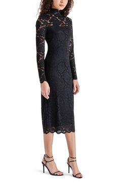 A long-sleeve dress crafted from lace bursting with roses adds a dose of sweetness to your ensemble. Mock neck Long sleeves Partially lined 100% nylon Hand wash, dry flat Imported Model stats: 5'10" height, 41" bust, 36" waist, 48" hip. Fitted Long Sleeve Dresses With Scalloped Lace, Long Sleeve Scalloped Lace Dress, Formal Long Sleeve Dresses With Scalloped Lace, Elegant Long Sleeve Dress With Scalloped Lace, Elegant Long Sleeve Scalloped Lace Dresses, Formal Fitted Long Sleeve Dress With Lace Sleeves, Formal Long Sleeve Dress With Lace Sleeves, Formal Long Sleeve Lace Dress With Scalloped Lace, Chic Long Sleeve Lace Dress For Formal Occasions