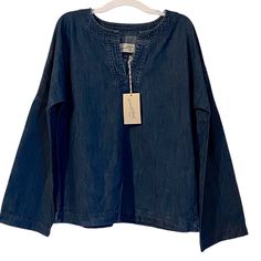 Casual Universal Thread Denim Pull Over. V-Neck And Drop Shoulder. Box Style, Loose Fit. Side Slits. 1 1/2 Inches. New With Tag. Msrp $24.99. No Known Flaws. Size Small Pit To Pit 21” Length 24.5” Sleeve Approx 21.5” 100% Cotton. No Stretch. Thanks So Much For Shopping With Me! Please Check Out My Closet For Another Identical Top. If You Find Anything Else In My Closet, Add To A Bundle, And Get A Discount! Non-Smoking, Pet Free Home. Quick Shipping! Blessings! Universal Thread, Denim Top, Loose Fitting, V Neck, Womens Tops, Women Shopping, Blue, Color