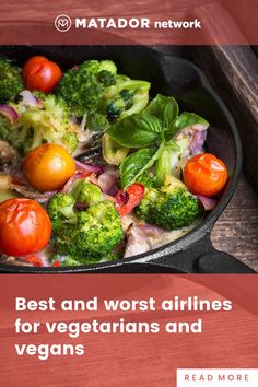 broccoli, tomatoes and onions in a skillet on a wooden table top