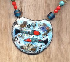 Tropical Whale Enamel Pendant Necklace, Artisan Turquoise Red Long necklace, Sea side Jewelry Handmade by AnnaArt72 Awesome Tropical Fish Sea side Necklace for layering necklace, size 27" materials   handmade ( by me ) enamel fish pendant, hand painted in hot enamel technique, 2.75" by 2.25" in size   natural turquoise magnesite stones, red shell beads, Czech glass fish beads   gold plated metal clasp and findings    Your handmade enamel Fish Necklace will come in a gift box back to my shop link Red Hand Painted Pendant Necklaces, Red Handmade Enamel Necklaces, Handmade Red Enamel Necklaces, Handmade Red Enamel Necklace, Blue Enamel Bohemian Necklaces, Handmade Enamel Round Necklace, Unique Enamel Necklace With Artistic Design, Unique Red Enamel Necklaces, Handmade Round Enamel Necklaces