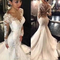 the back of a wedding dress with long sleeves