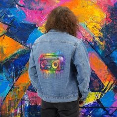 Step back in time with our Watercolor Splash Stereo Men's Denim Jacket, inspired by the iconic fashion of the 80s and 90s. This nostalgic jean jacket features a classic lapel collar and button-front closure for a timeless look, while the medium denim wash adds a touch of rugged charm to any outfit. Made from a blend of 90% cotton, 6% polyester, 3% rayon, and 1% spandex, it offers a comfortable relaxed fit and lasting durability. With convenient front slant pockets, this jacket is as functional as it is stylish, making it the perfect gift for him. Sewn-in label on the bottom left side adds a subtle touch of authenticity. Embrace retro fashion with this versatile and nostalgic wardrobe staple. RETURNS OR EXCHANGES *Please understand that as all of our items are custom printed after you order Retro Denim Jacket With Graphic Print For Streetwear, Multicolor Denim Jacket For Streetwear, Retro Acid Wash Cotton Denim Jacket, Retro Cotton Acid Wash Denim Jacket, Denim Jacket Vintage, Unique Jackets, Unique Gifts For Him, Iconic Fashion, Retro Mode