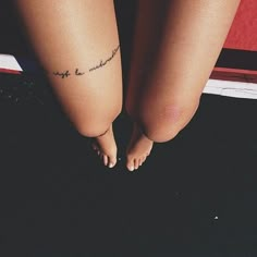 a woman's legs with the word love written on them