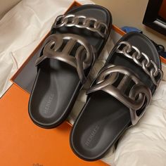 Hermes Nappa Extra Sandals 38 Gris Argent Brand New With Box Purchase At Plam Beach Fl Purchased 2 Sandals At Same Time, Will Keep One For My Self, But I Love Both Hermes Oran Sandals Gray, Hermes Extra Sandal, Modern Silver Slip-on Sandals, Designer Silver Open Toe Sandals, Silver Open Toe Sandals For Galas, Luxury Silver Sandals With Removable Insole, Luxury Silver Open Toe Sandals, Luxury Silver Sandals With Round Toe, Designer Silver Sandals