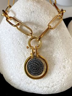 Buy an original Greek Pendant 22k Gold plated Phaistos Disk | Discover Greek Jewelry within a huge collection of Ancient Greek Jewelry | shipping worldwide This amazing piece of jewelry is representing the Ancient Greek Symbol so called Phaistos disc. An excellent gift for women and also for men that would love to wear a geometric symbol. Ideal present for someone who have already spent time in this beautiful island or he comes from this. Size The diameter of the big disc is 2.cm The thickness i Modern Gold Necklaces With Detachable Pendant, Gold Sterling Silver Chain Necklace With Oval Pendant, Handmade Gold Plated Round Pendant Necklace, Modern Gold Necklace With Detachable Pendant, Handmade Gold Plated Chain Necklace With Round Pendant, Gold Sterling Silver Medallion Necklace With Adjustable Chain, Gold Plated Chain Necklace With Detachable Pendant As Gift, Silver Oval Pendant Charm Necklace In Gold Plated, Modern Coin Pendant Necklace As Gift